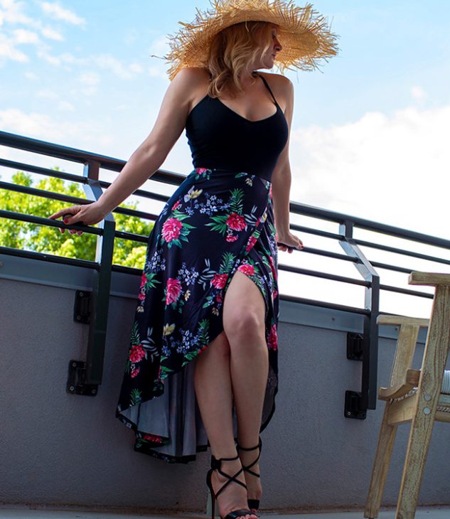 Megan Love, an escort in Clarksville, TN, standing on a hotel balcony.